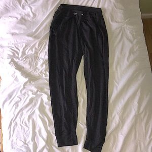 Dark Gray women’s Sweatpants with Tie at the waist, zip up pockets, size XL